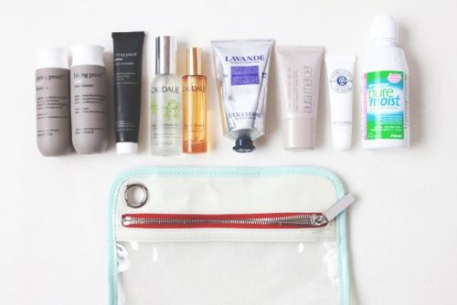 travel toiletries laid out on the counter